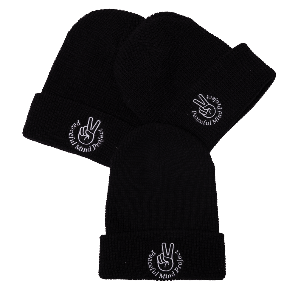 Set of three black beanie with Peaceful Mind Project name and peace sign